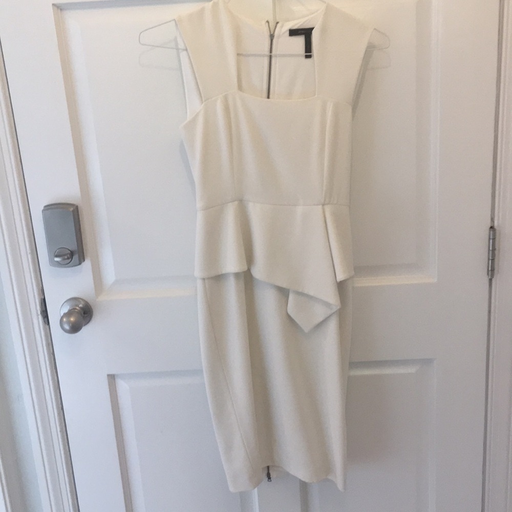 BCBG fitted white peplum dress